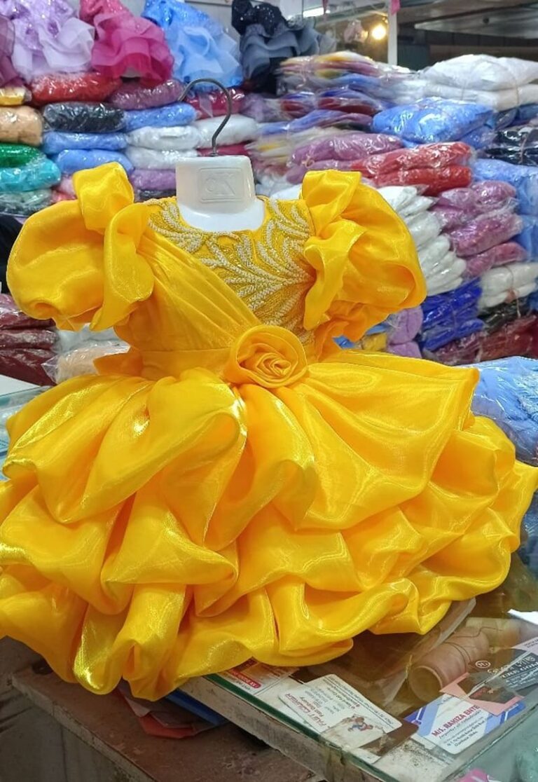 Premium Golden Yellow Baby Ball Gown with heavy pearl-beaded embroidery, puffed ruffle sleeves, and a 3D rose waistline