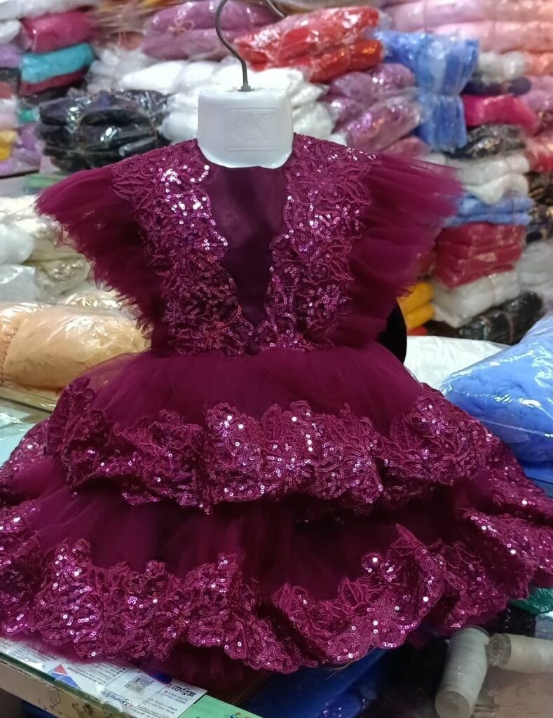 Premium Magenta Shimmery Baby Dress Ball Gown with sequined lace borders, flutter ruffle sleeves, and tiered voluminous net design - HKD927 - Kiddleplace