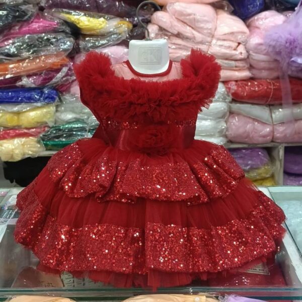 Premium Red Shimmery Baby Dress Ball Gown with sequined tiered ruffles, off-the-shoulder fluffy net design, and floral waist accent - HKD929 - Kiddleplace