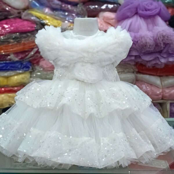 Premium White Shimmery Baby Dress Ball Gown with silver sequined tiered ruffles, off-the-shoulder fluffy net design, and floral waist accent - HKD920 - Kiddleplace