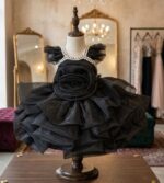 Black rose party dress for girls with pearl detailing and ruffled tulle layers