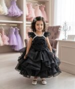 Black rose party dress for girls with pearl detailing and ruffled tulle layers