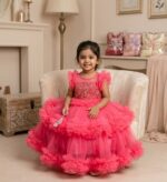 Pink ruffle party dress for girls with gold embroidery bodice and tiered net skirt